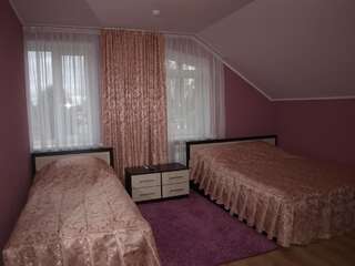 Гостиница Династия Нижний Новгород Двухместный номер с 2 отдельными кроватями и собственной ванной комнатой-4